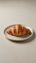 Artisanal Croissant on Porcelain Plate